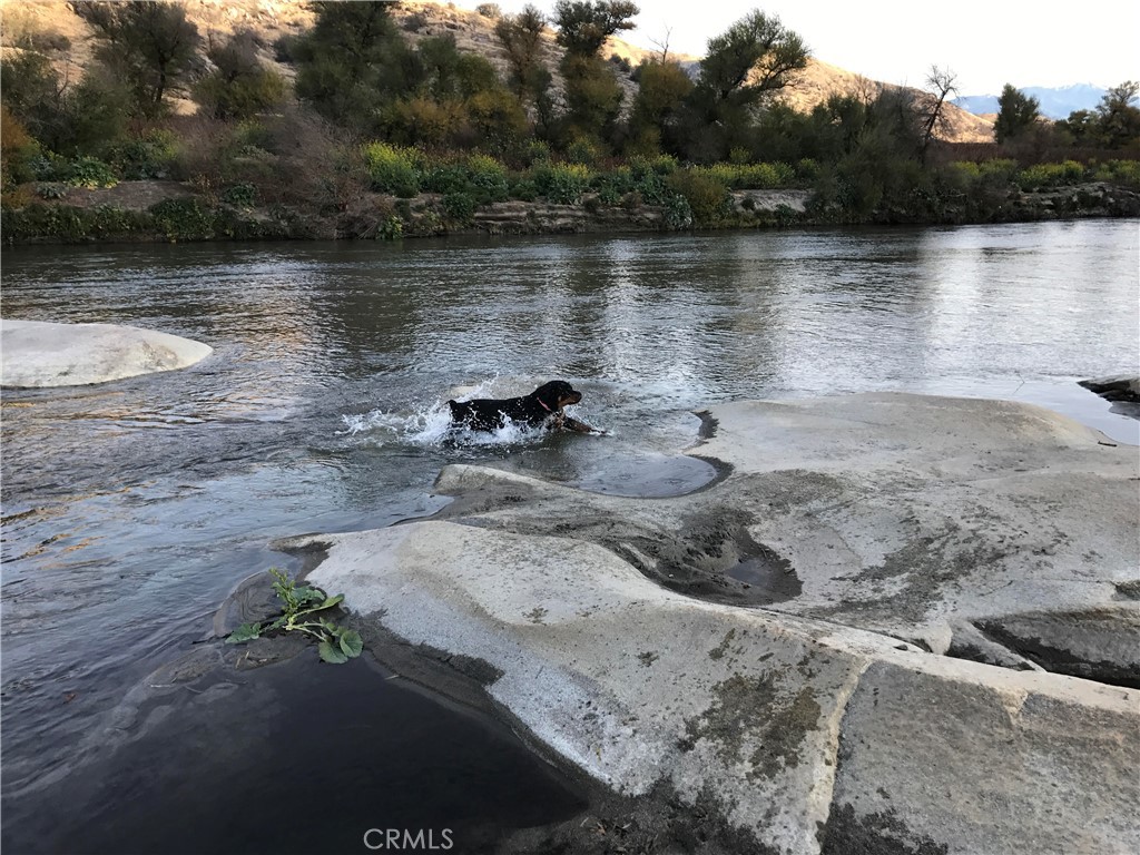 40820 Oak Ridge Drive Three Rivers, CA 93271 - Photo 61 of 65 a view of a lake with a mountain in the background