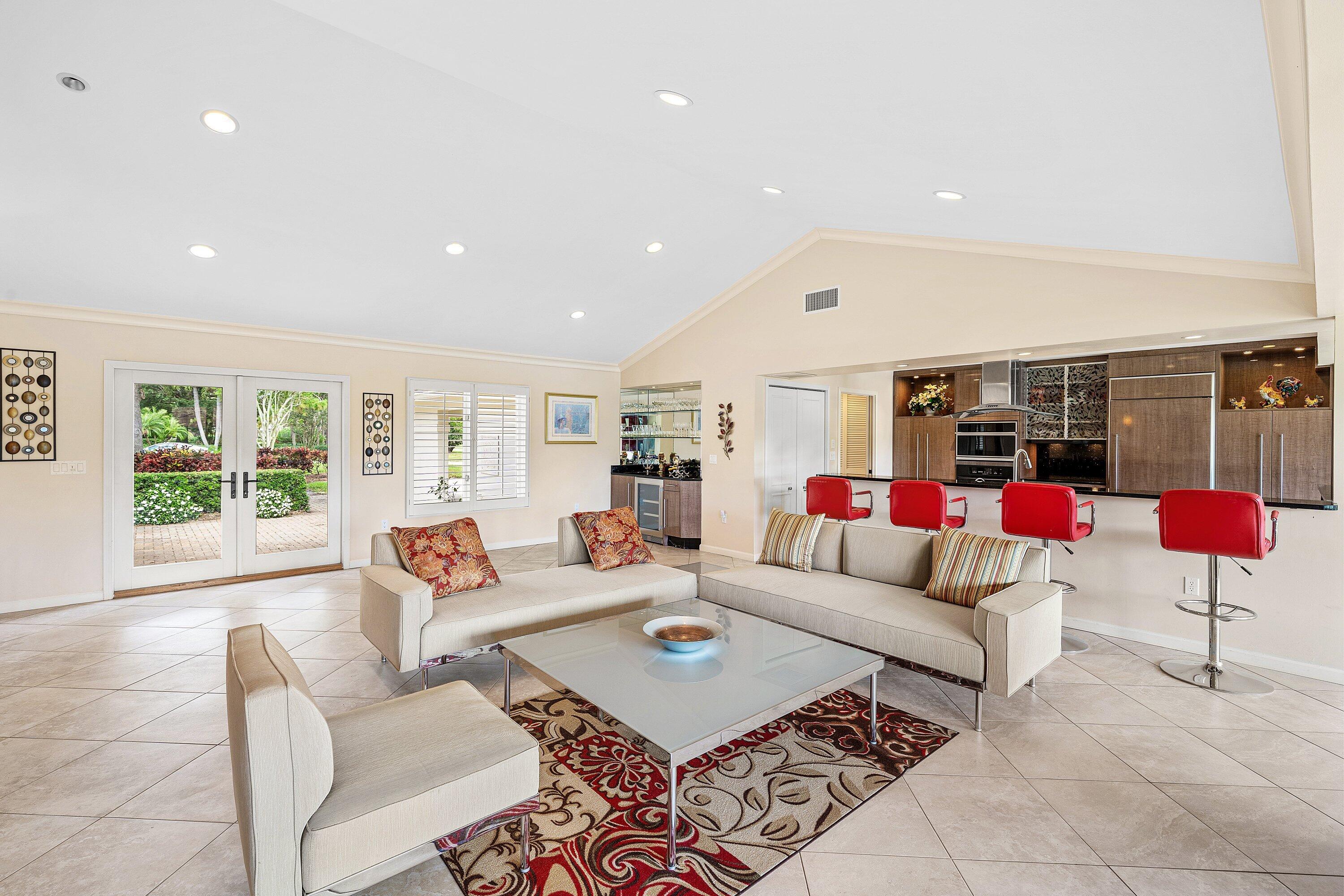 4365 Shell Drake Lane Boynton Beach, FL 33436 - Photo 10 of 56 a living room with furniture and a table