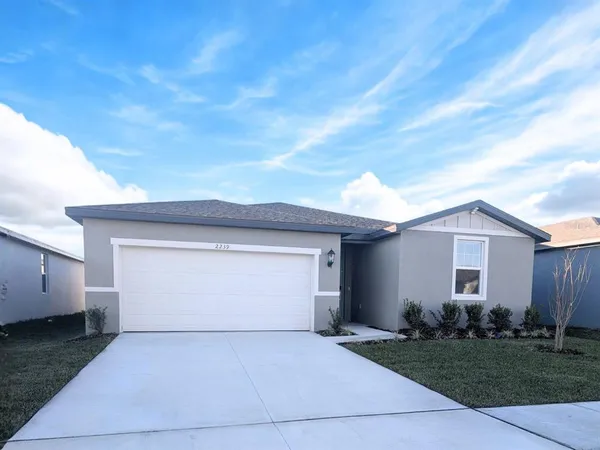a front view of house with yard