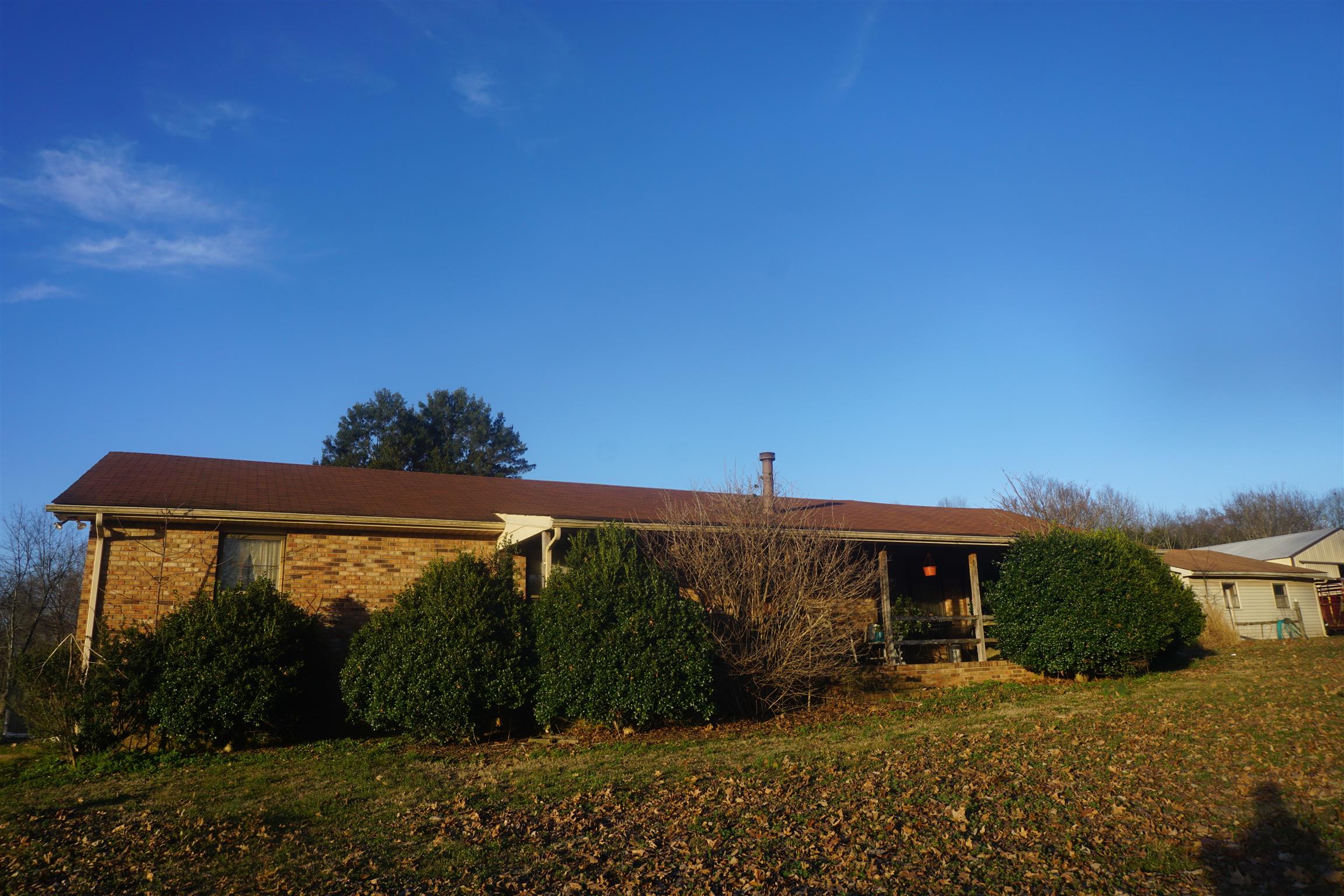 283 Salem Road Lebanon, TN 37090 - Photo 3 of 17 a front view of a house with garden