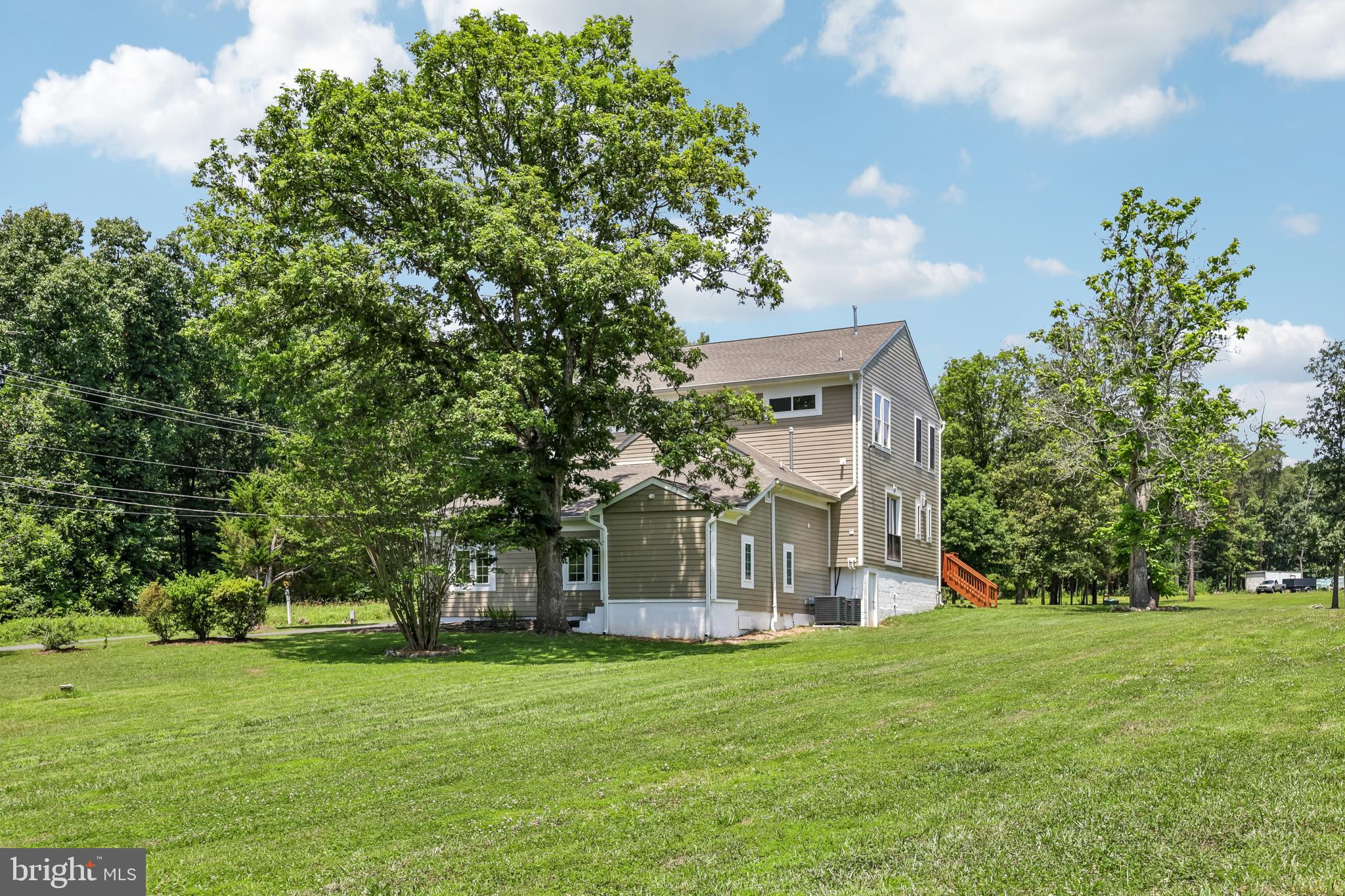 12304 Popes Head Road Fairfax, VA 22030 - Photo 72 of 78 a front view of a house with a yard