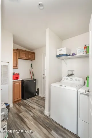 a storage room with washer and dryer