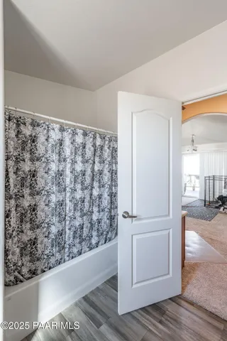 a view of entryway with wooden floor