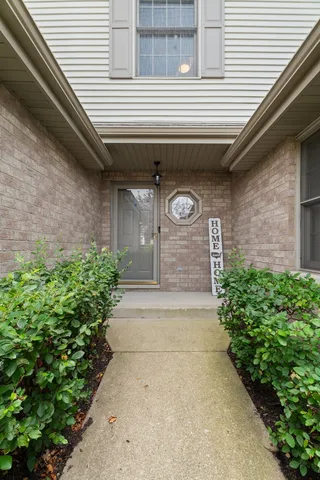 a front view of a house with a garage