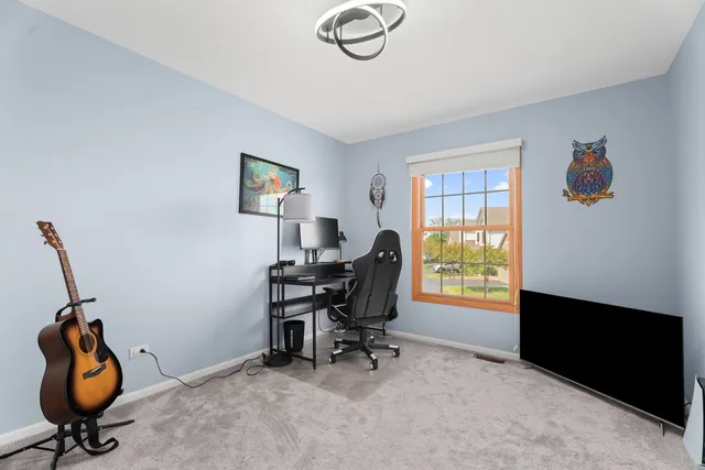 a view of workspace with gym equipment