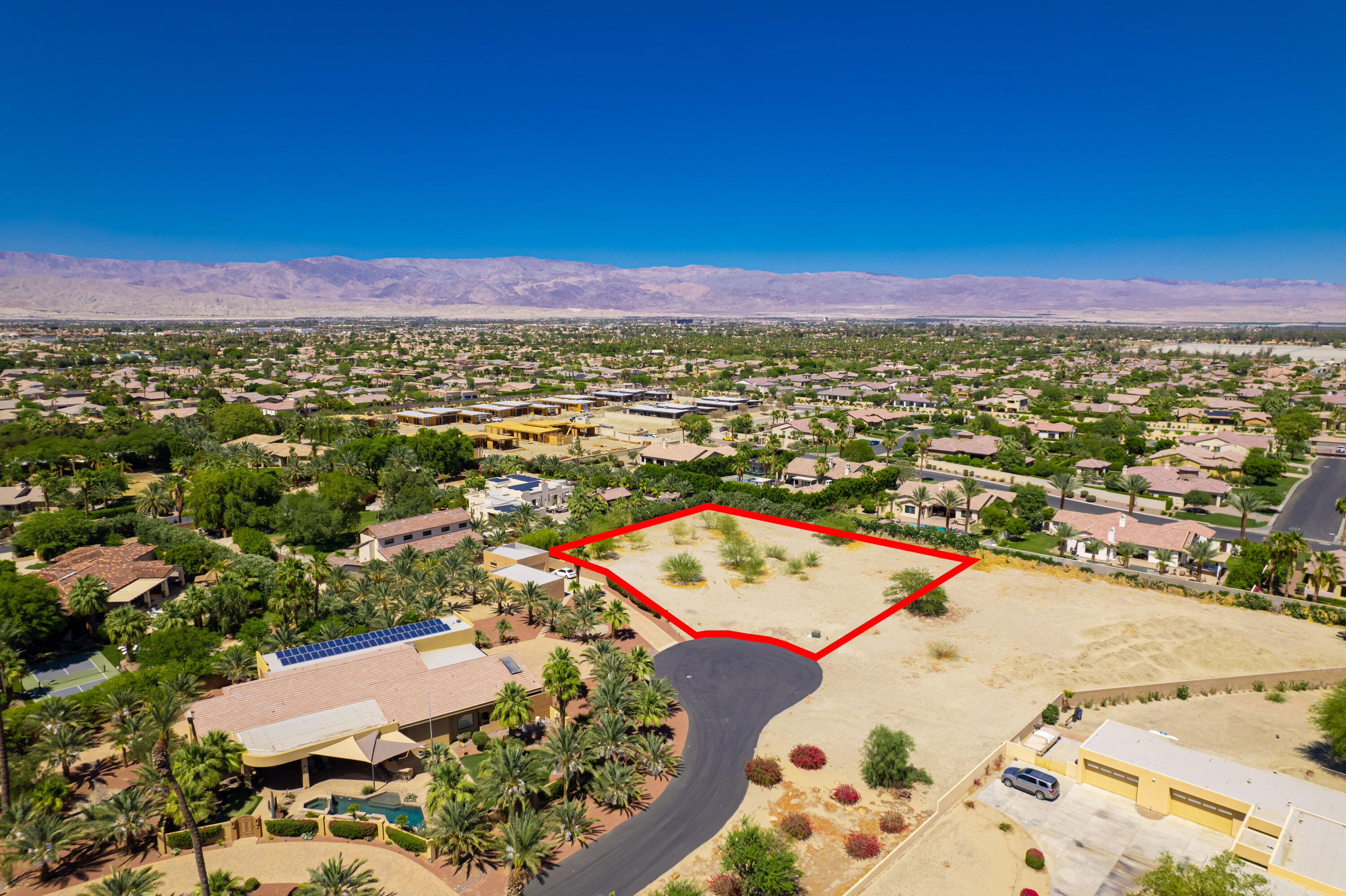 Lot 2 Mallet Court Indio, CA 92201 - Photo 12 of 12 an aerial view of a city with lots of residential buildings