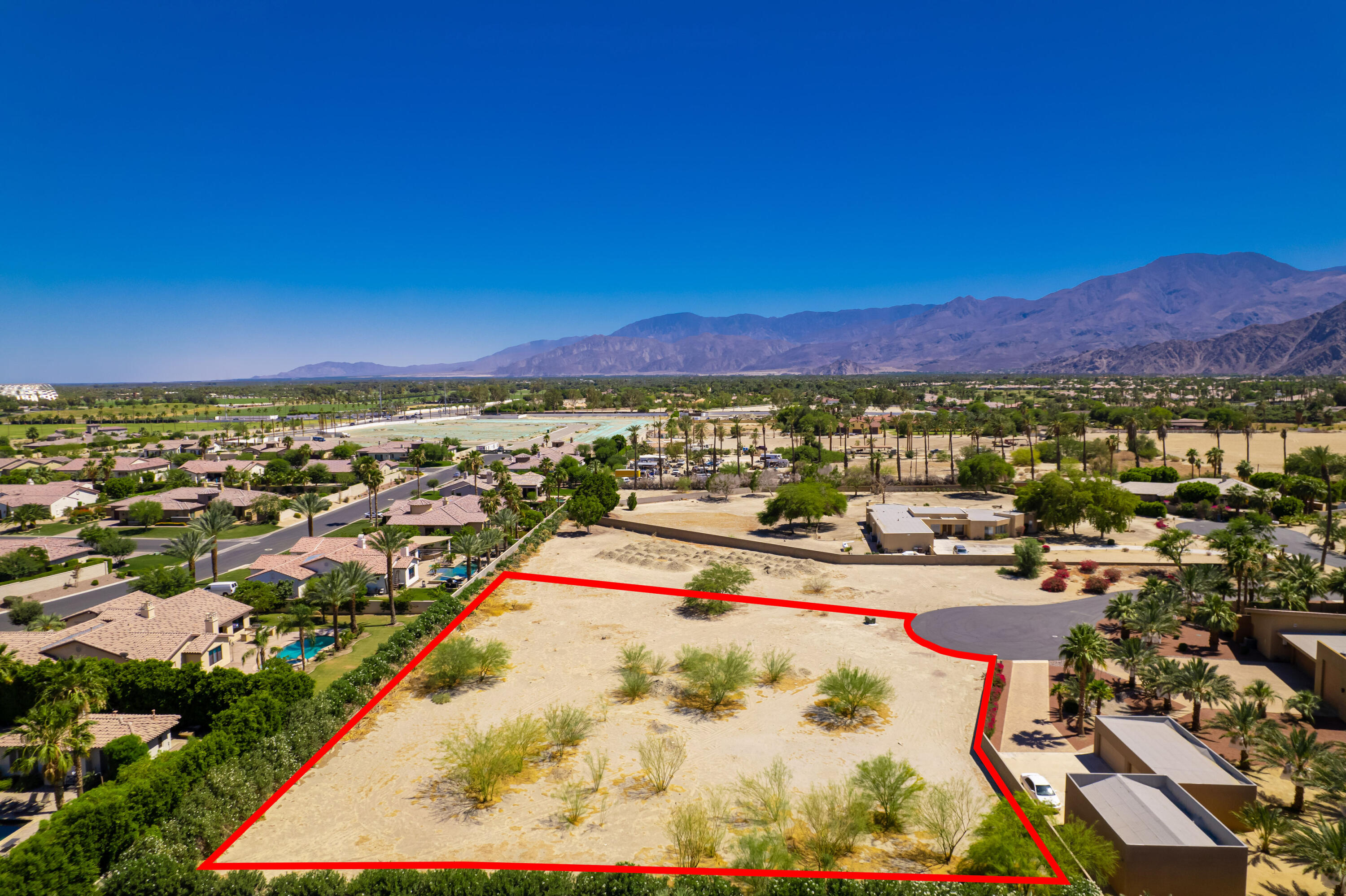 Lot 2 Mallet Court Indio, CA 92201 - Photo 7 of 12 an aerial view of residential houses with outdoor space