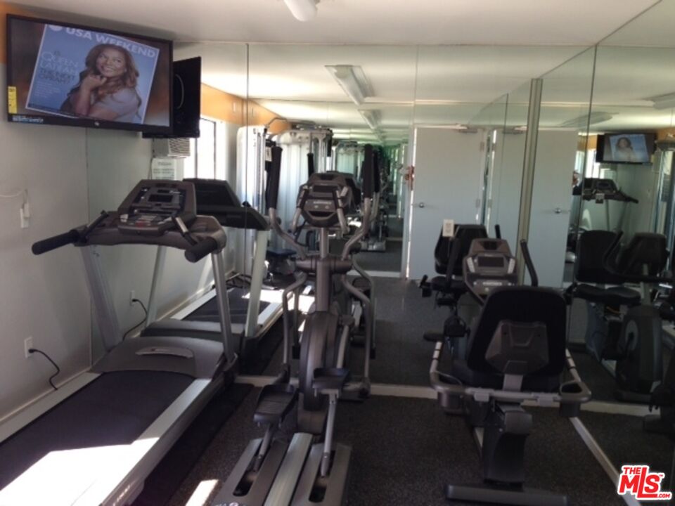 11730 Sunset Boulevard Los Angeles, CA 90049 - Photo 11 of 13 a view of a room with gym equipment