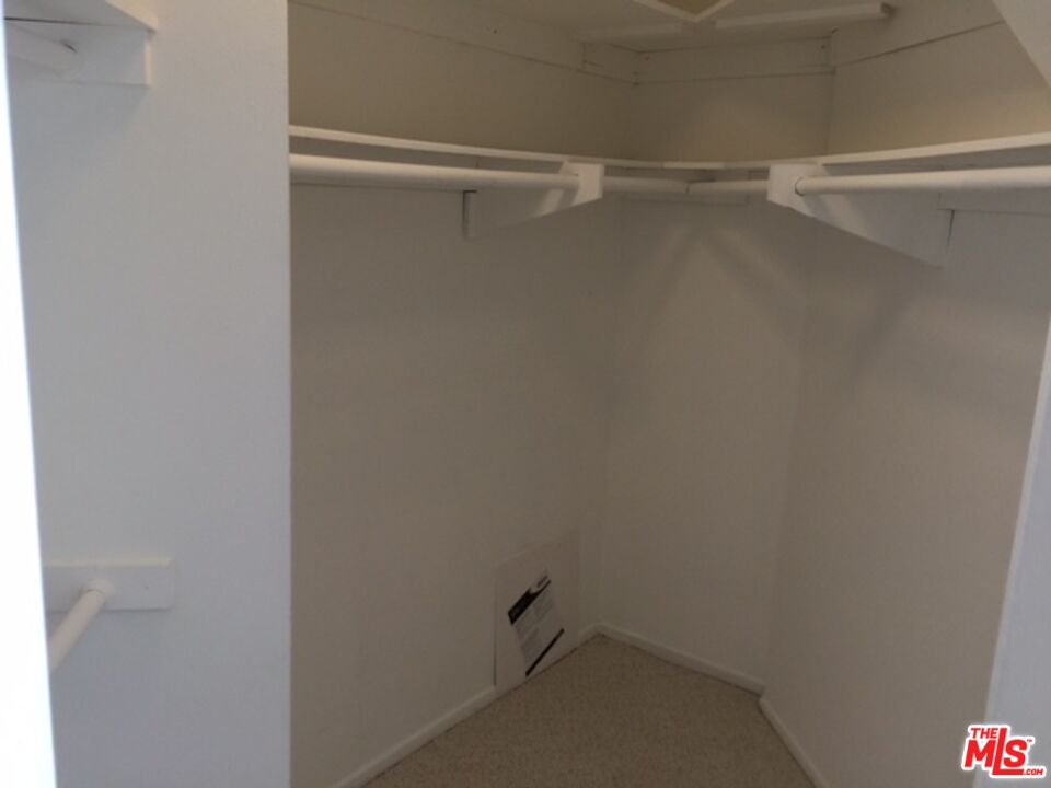 11730 Sunset Boulevard Los Angeles, CA 90049 - Photo 6 of 13 a view of an empty walk in closet