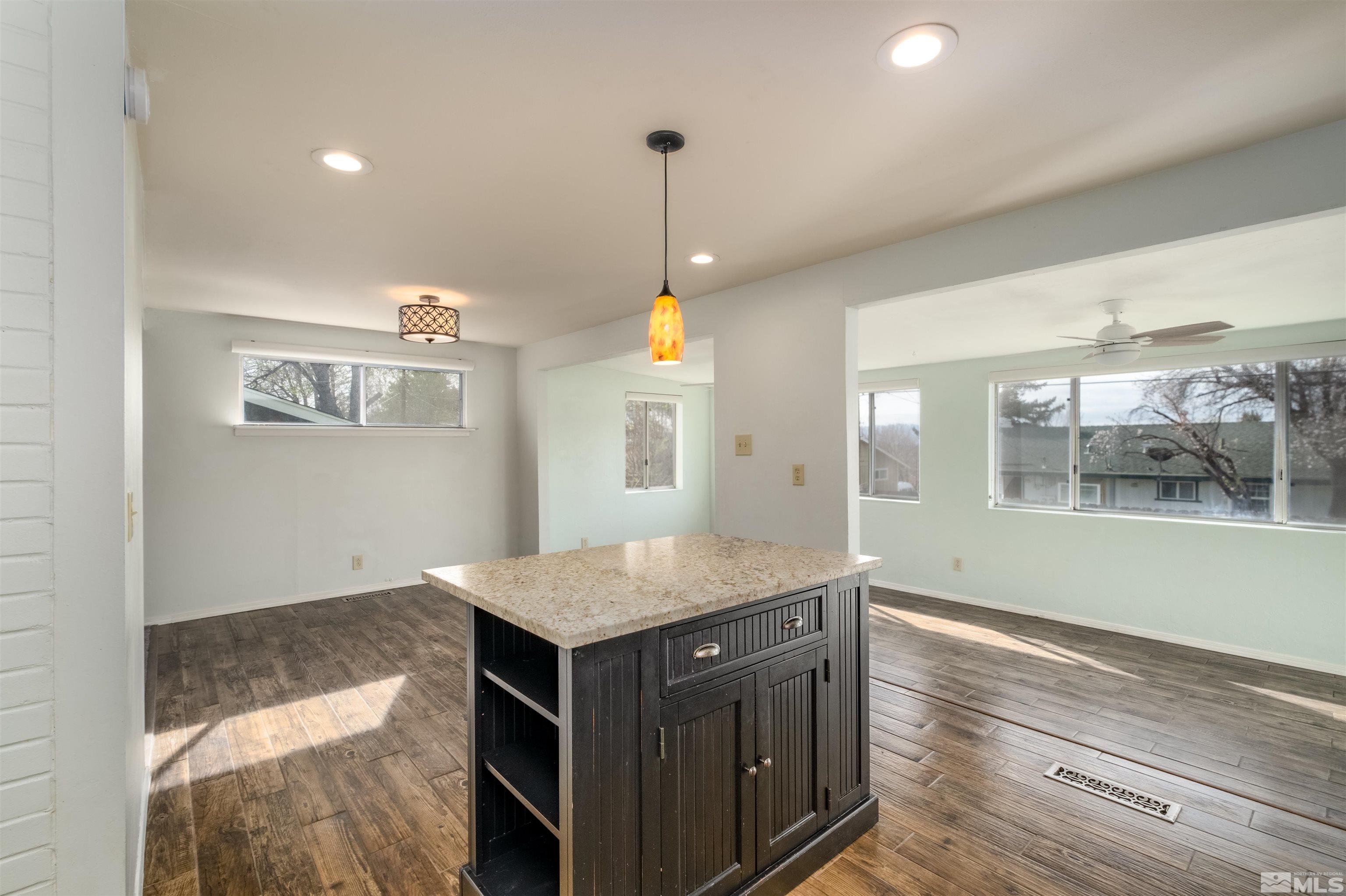1800 West 6th Street Reno, NV 89503 - Photo 16 of 23 a kitchen with a wooden floor and window
