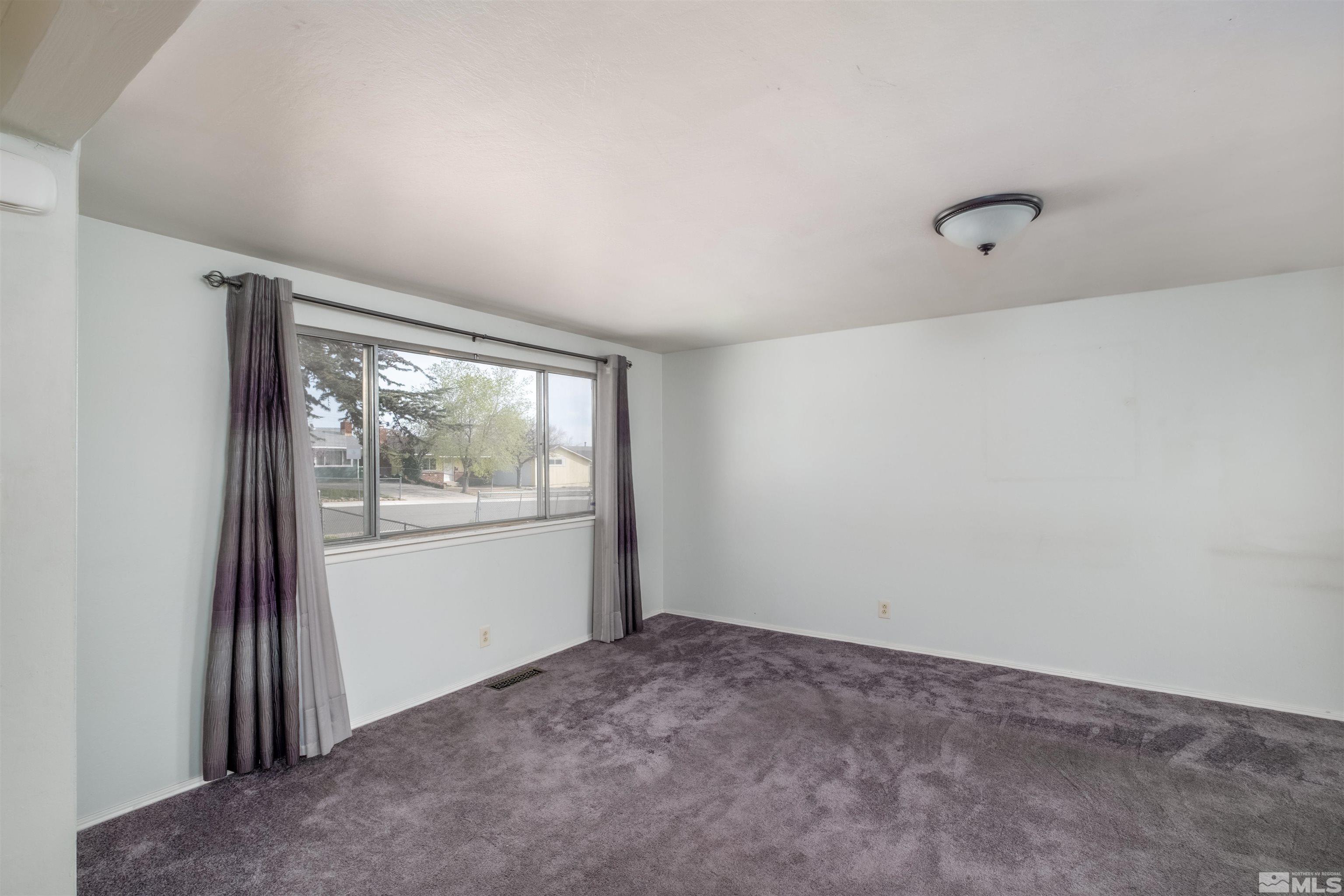 1800 West 6th Street Reno, NV 89503 - Photo 20 of 23 a view of an empty room with a window