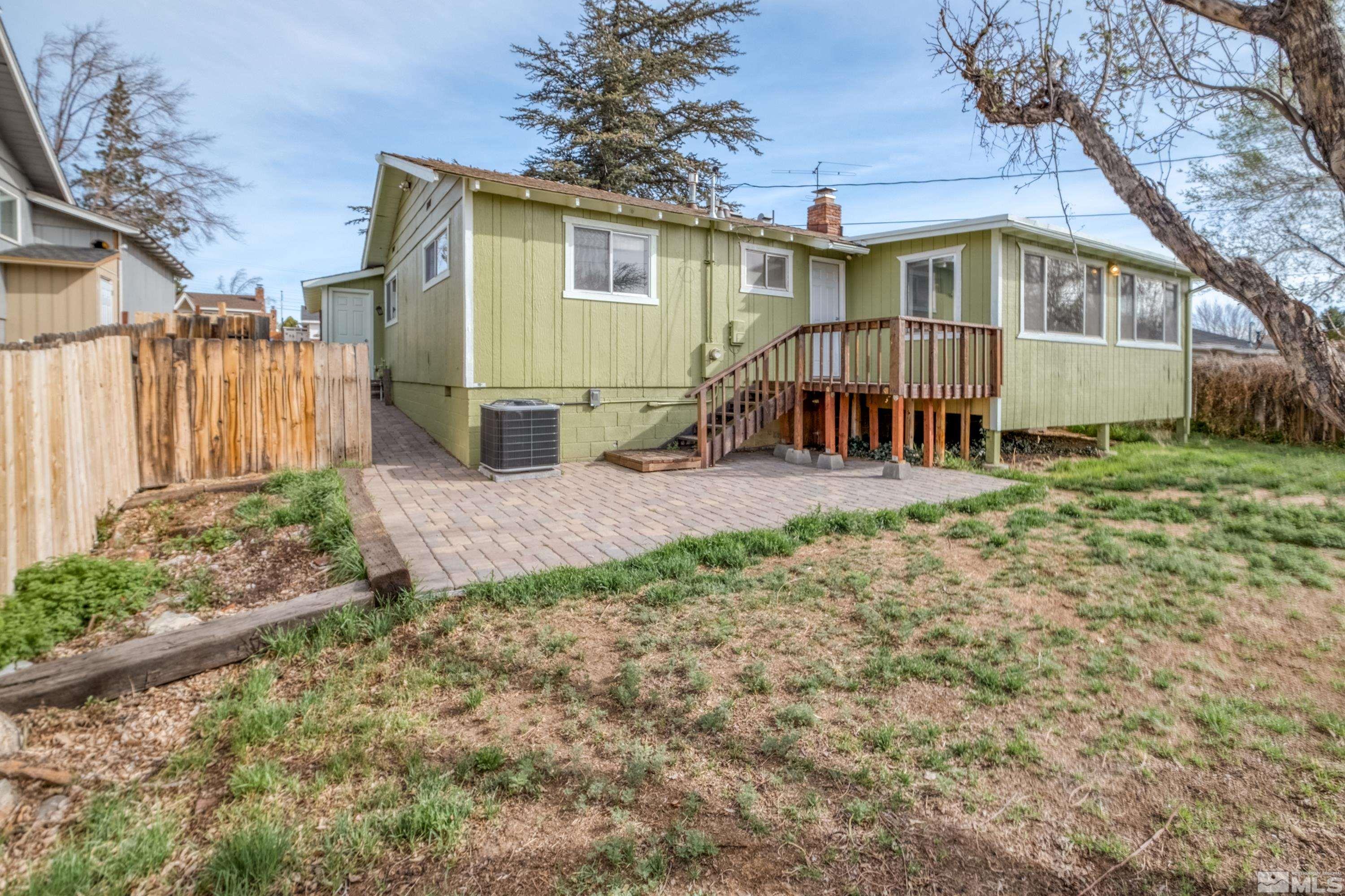 1800 West 6th Street Reno, NV 89503 - Photo 2 of 23 a view of a house with backyard and sitting area