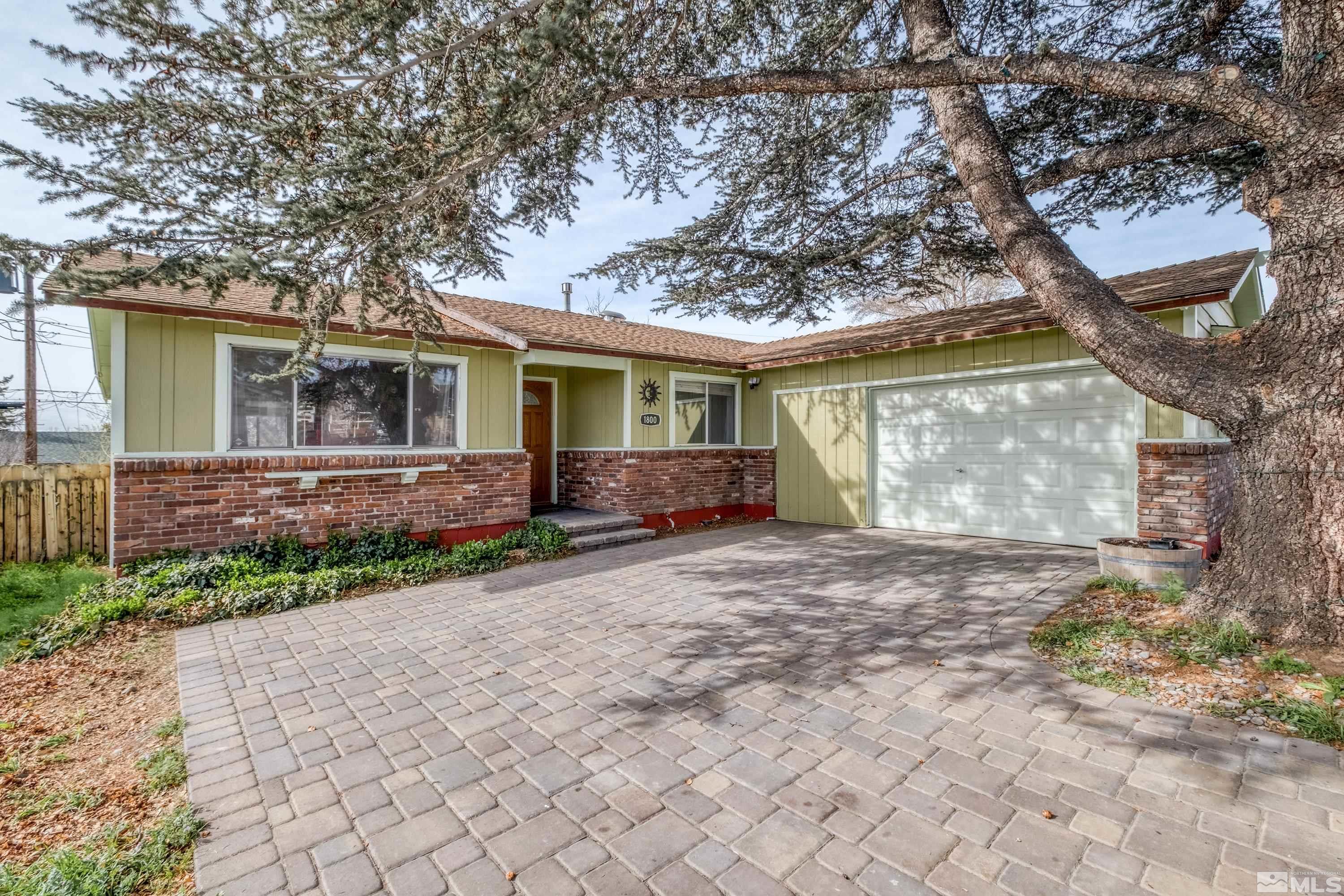 1800 West 6th Street Reno, NV 89503 - Photo 7 of 23 a front view of a house with garden