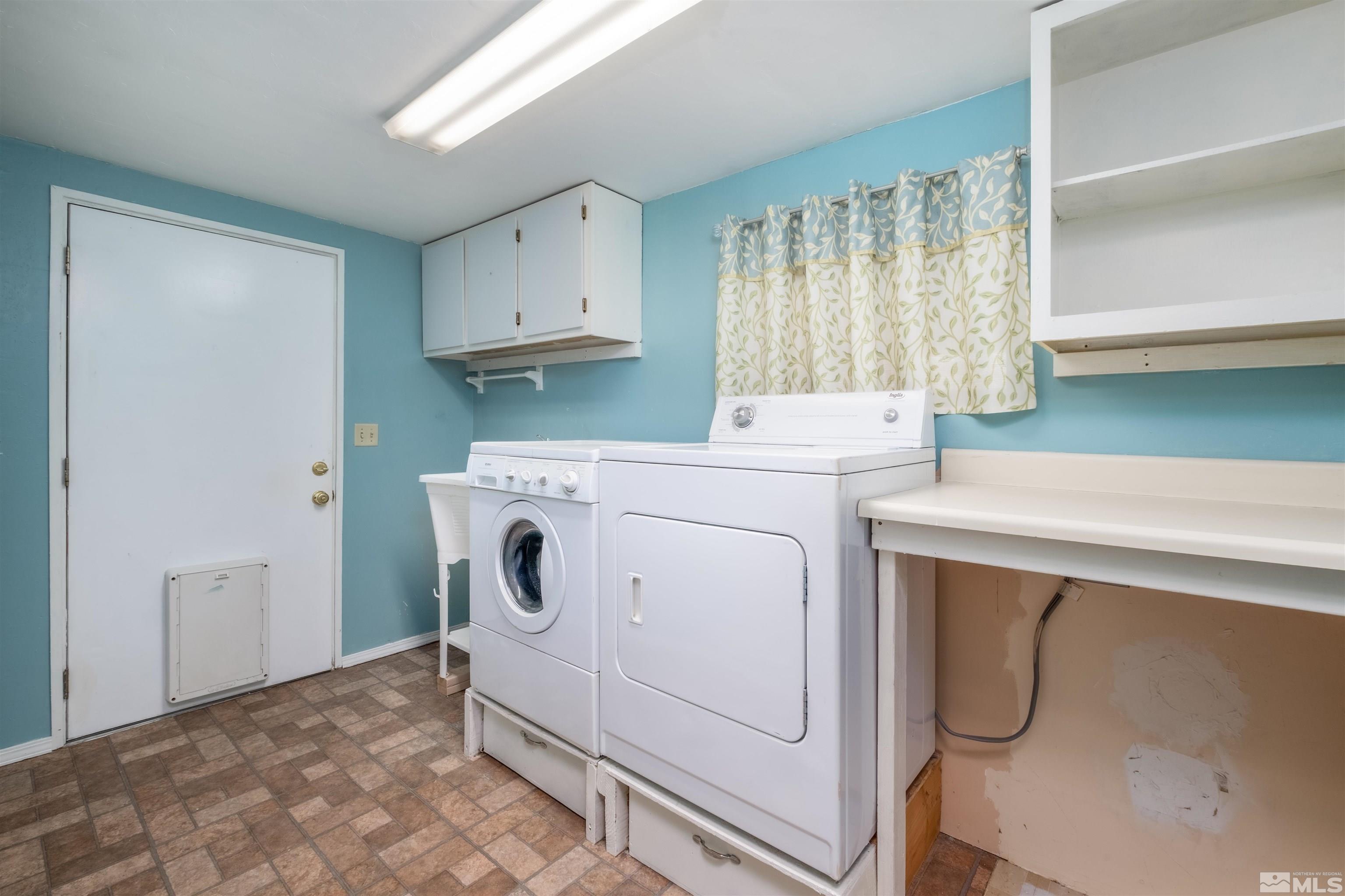 1800 West 6th Street Reno, NV 89503 - Photo 10 of 23 a utility room with dryer and washer