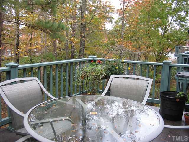 8214 Lloyd Allyns Way Raleigh, NC 27615 - Photo 14 of 16 The deck overlooks the wooded buffer. Look to your right for a view of the lake.