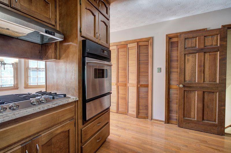260 Spring Ridge Drive Roswell, GA 30076 - Photo 18 of 52 a kitchen with stainless steel appliances granite countertop a refrigerator and a stove top oven