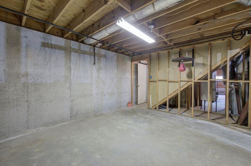 260 Spring Ridge Drive Roswell, GA 30076 - Photo 36 of 52 a view of an empty room with wooden roof