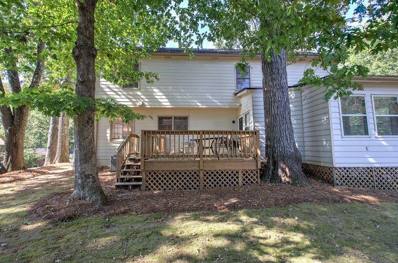 260 Spring Ridge Drive Roswell, GA 30076 - Photo 39 of 52 a view of a house with a yard