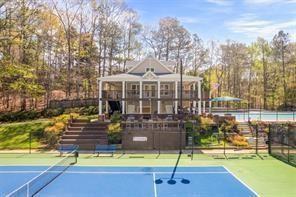 260 Spring Ridge Drive Roswell, GA 30076 - Photo 49 of 52 a view of a house with swimming pool
