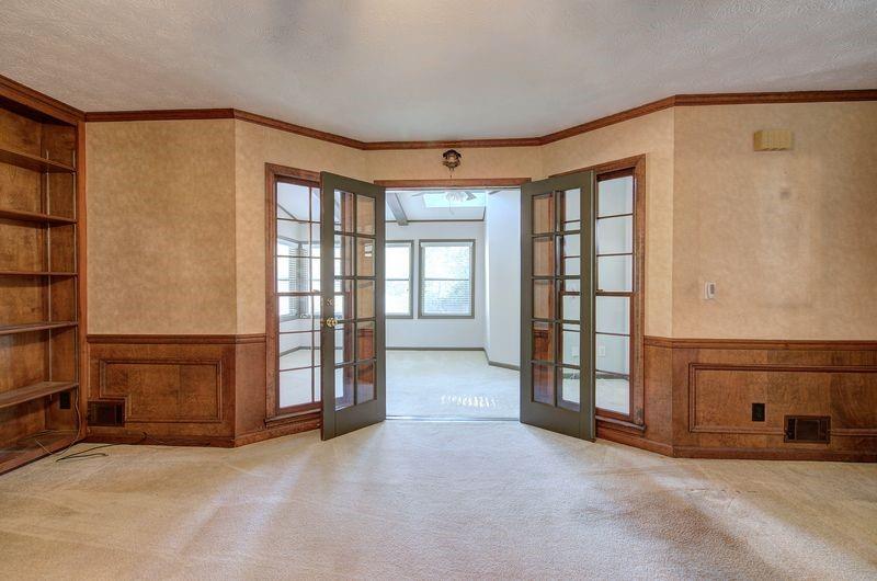 260 Spring Ridge Drive Roswell, GA 30076 - Photo 5 of 52 an empty room with windows
