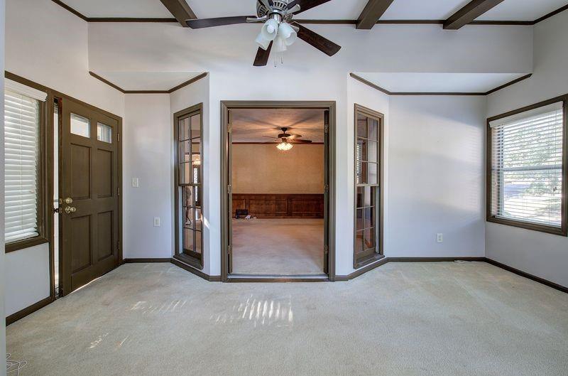 260 Spring Ridge Drive Roswell, GA 30076 - Photo 7 of 52 an empty room with closet and windows