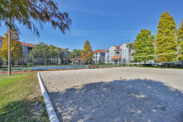 a view of backyard with a patio