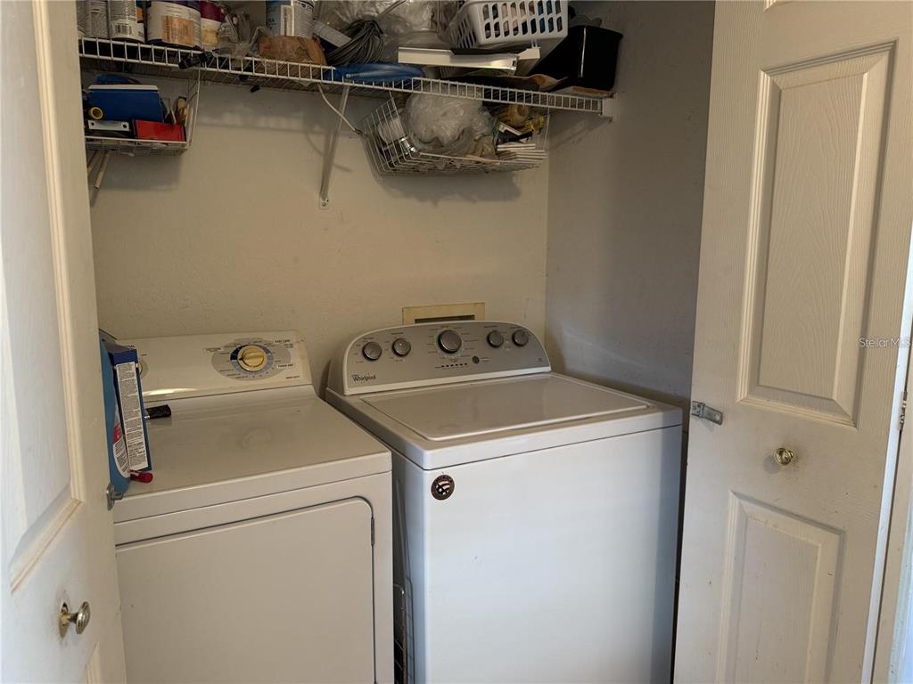 871 Reflections Loop East Winter Haven, FL 33884 - Photo 13 of 23 a utility room with dryer and washer