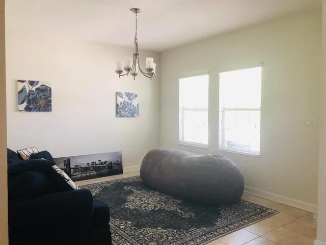 an empty room with closet and a bathroom