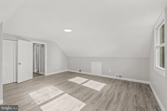 a view of a backyard with swimming pool