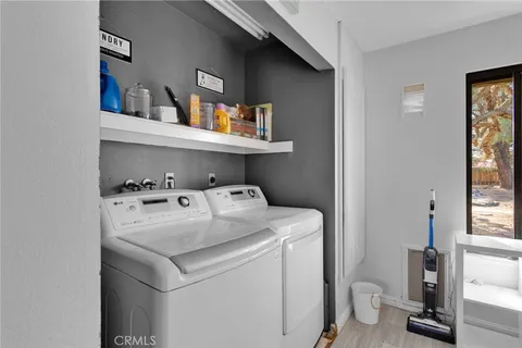 a storage room with furniture and a window