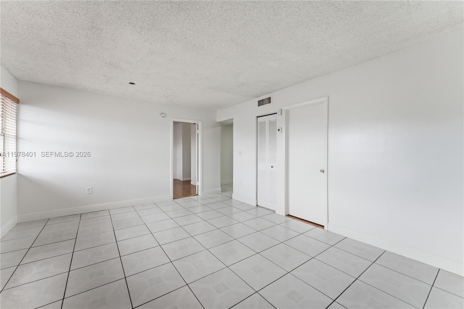 6921 Southwest 129th Avenue, Unit 5 Miami, FL 33183 - Photo 25 of 34 a view of an empty room