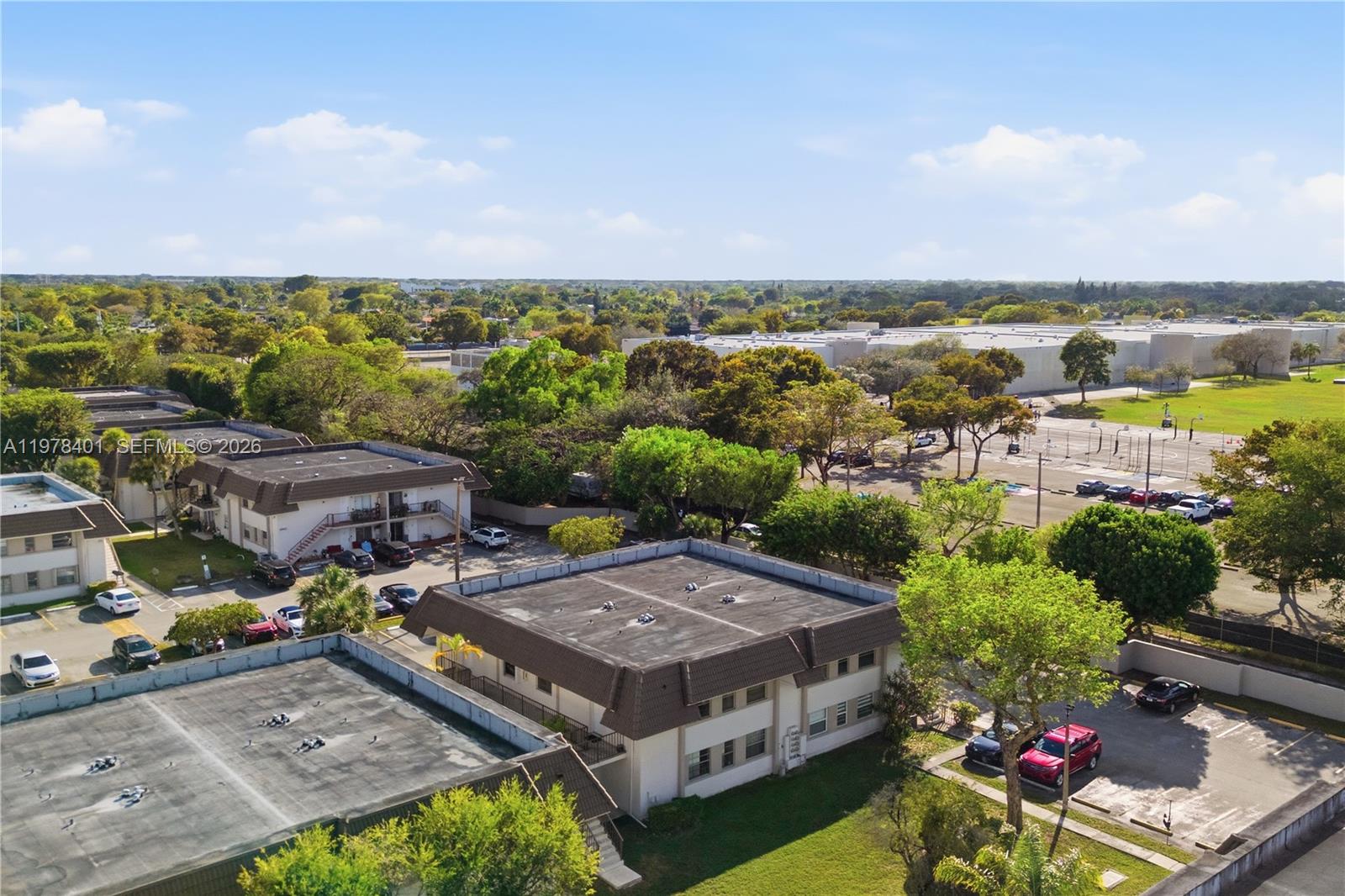 6921 Southwest 129th Avenue, Unit 5 Miami, FL 33183 - Photo 28 of 34 an aerial view of multiple house