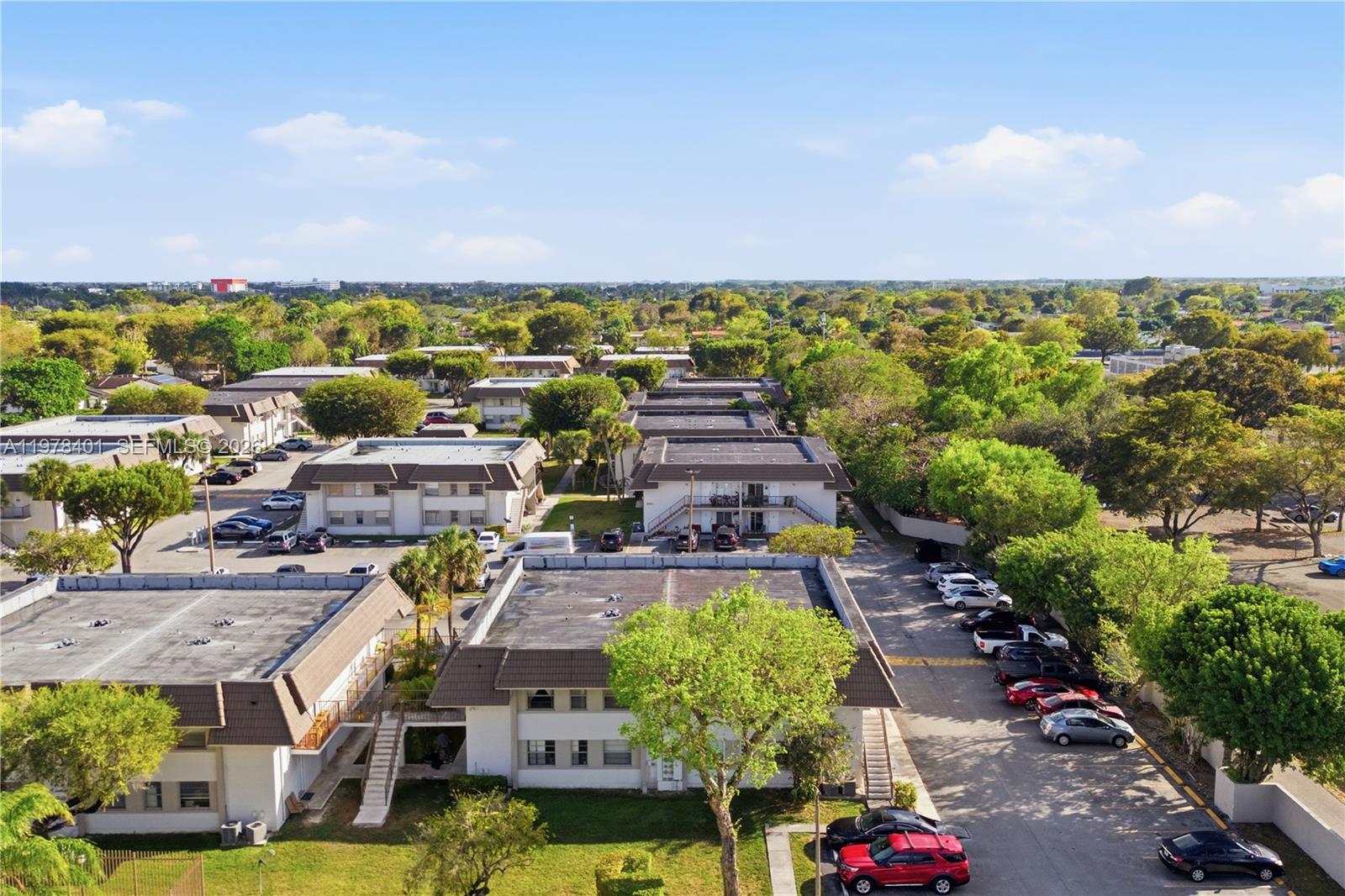 6921 Southwest 129th Avenue, Unit 5 Miami, FL 33183 - Photo 34 of 34 a view of a city with lawn chairs