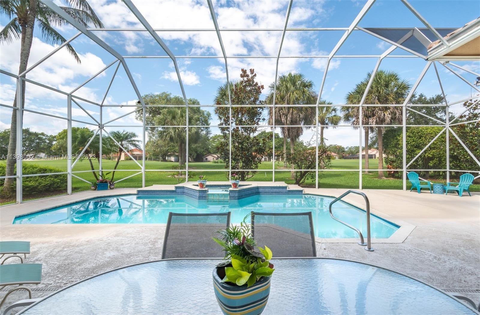 3155 Inverness Weston, FL 33332 - Photo 20 of 58 a view of a backyard with swimming pool and couches