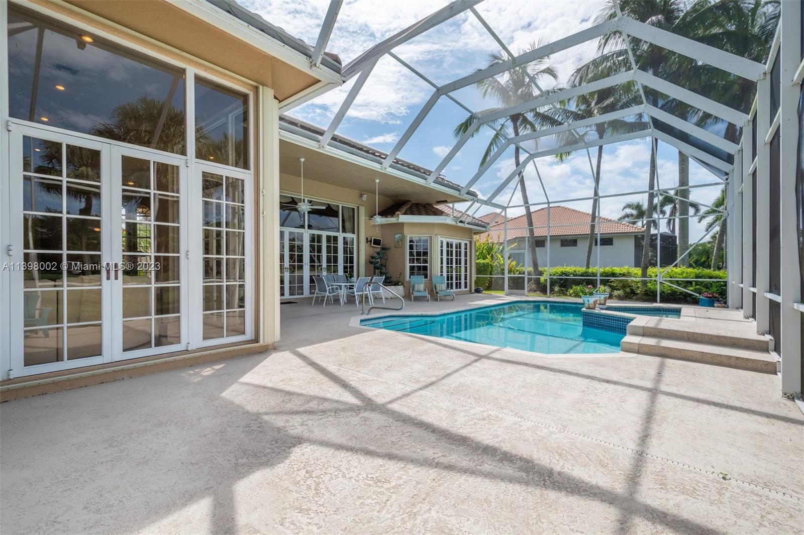 3155 Inverness Weston, FL 33332 - Photo 21 of 58 a view of a building with a porch