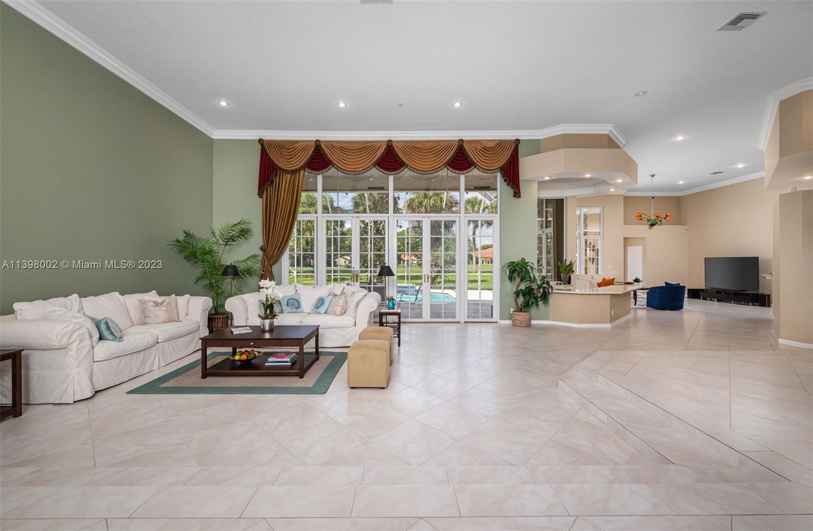 3155 Inverness Weston, FL 33332 - Photo 27 of 58 a living room with furniture and a large window
