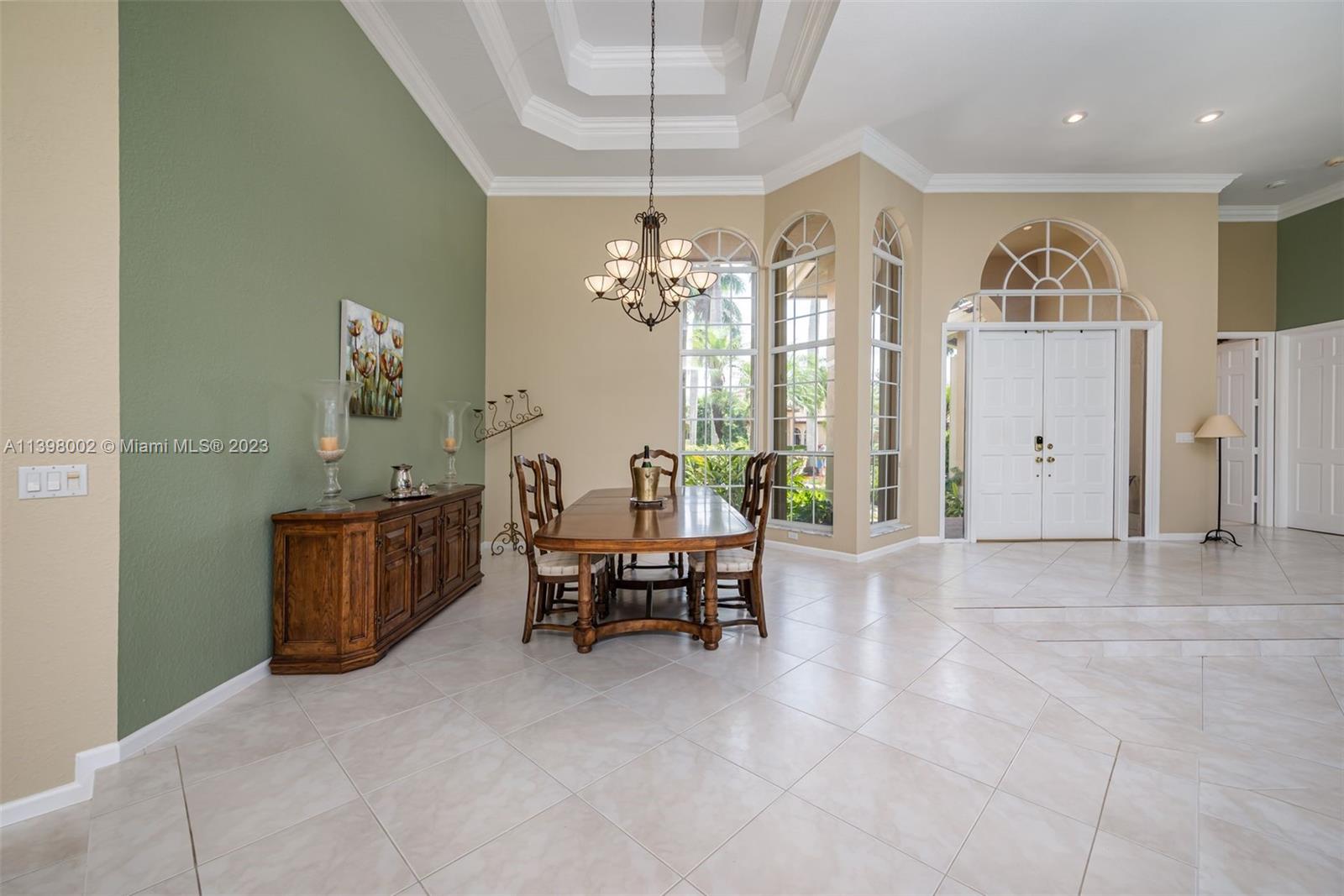 3155 Inverness Weston, FL 33332 - Photo 30 of 58 a view of a livingroom with furniture and a chandelier