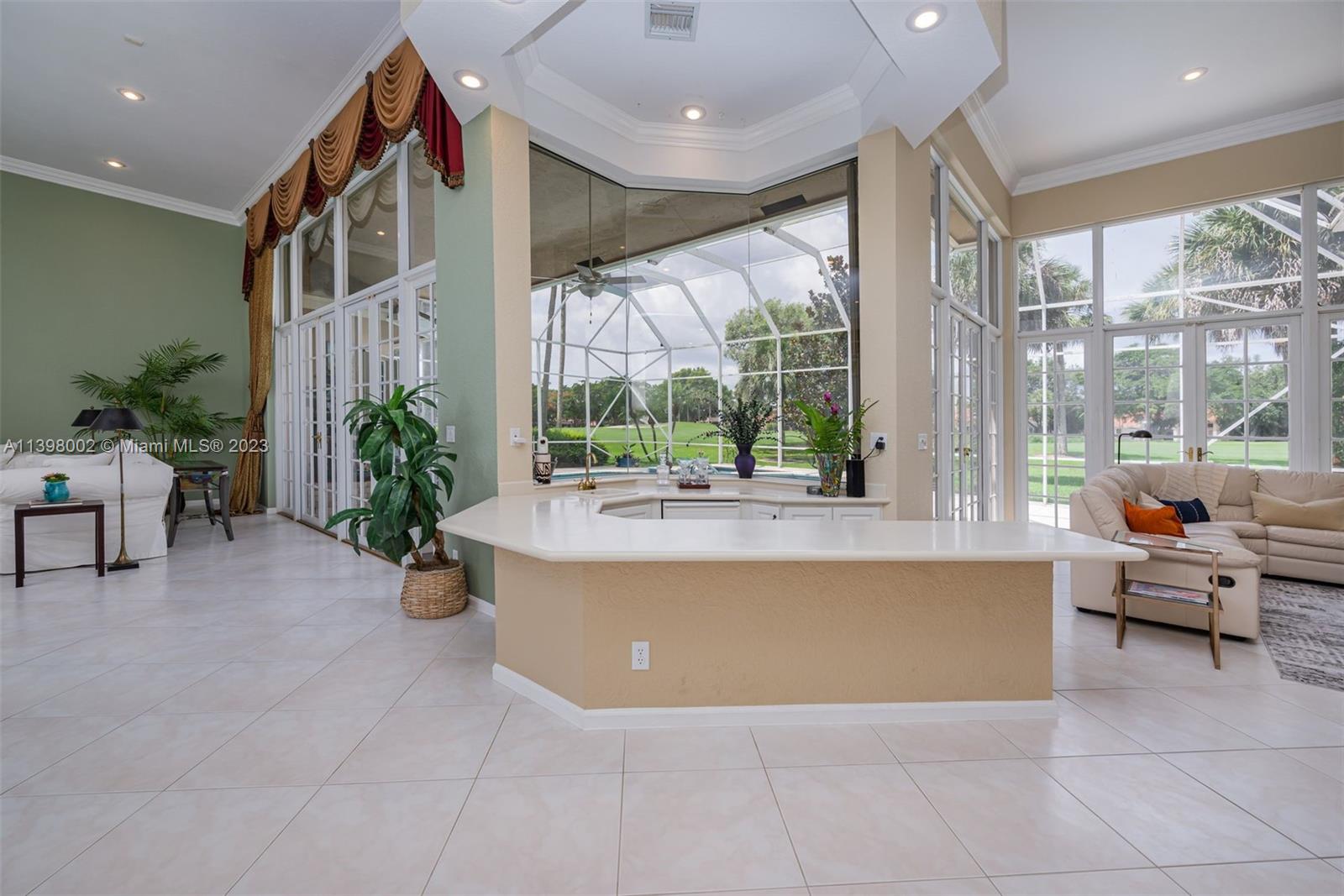 3155 Inverness Weston, FL 33332 - Photo 38 of 58 a living room with furniture and a large window