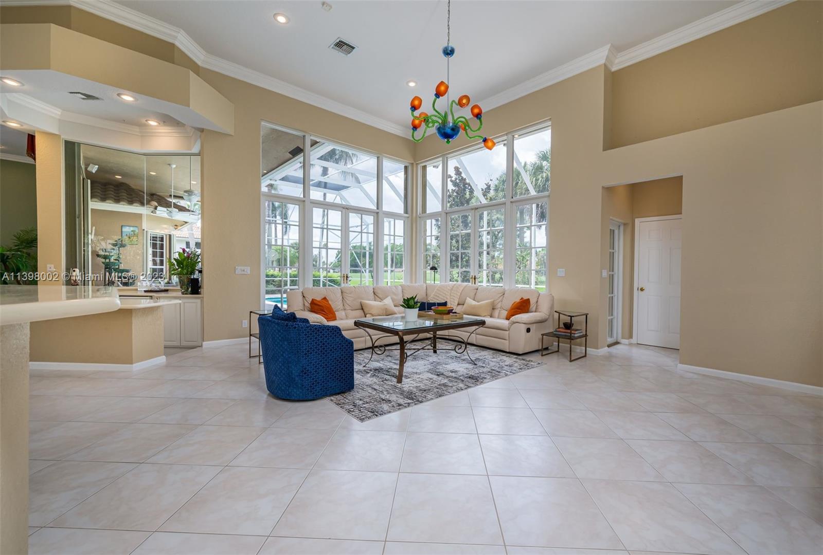3155 Inverness Weston, FL 33332 - Photo 40 of 58 a living room with furniture and a large window