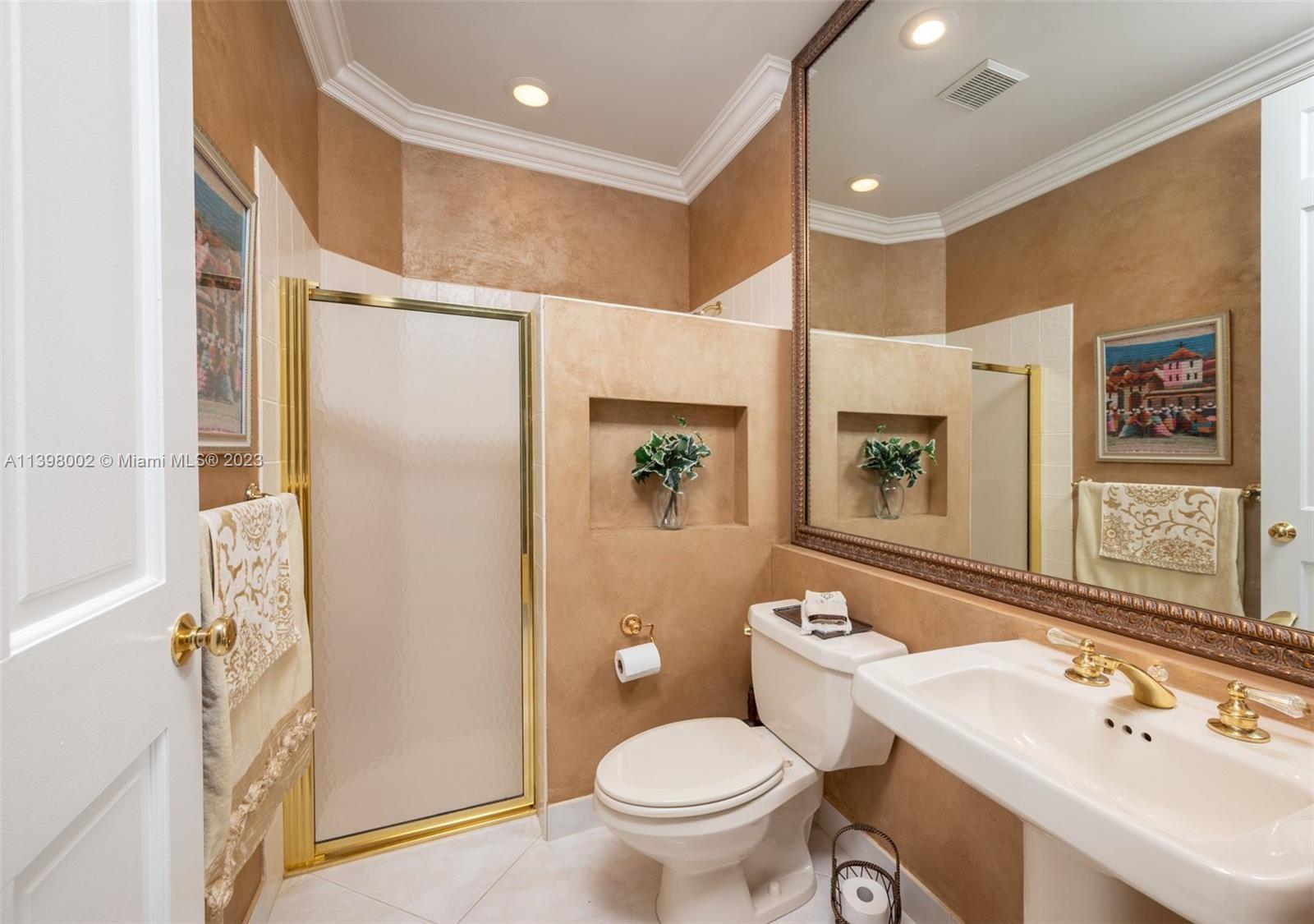 3155 Inverness Weston, FL 33332 - Photo 54 of 58 a bathroom with a sink toilet and shower