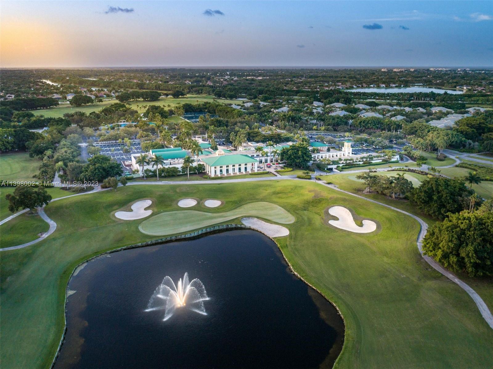 3155 Inverness Weston, FL 33332 - Photo 57 of 58 an aerial view of a golf course with a ocean view