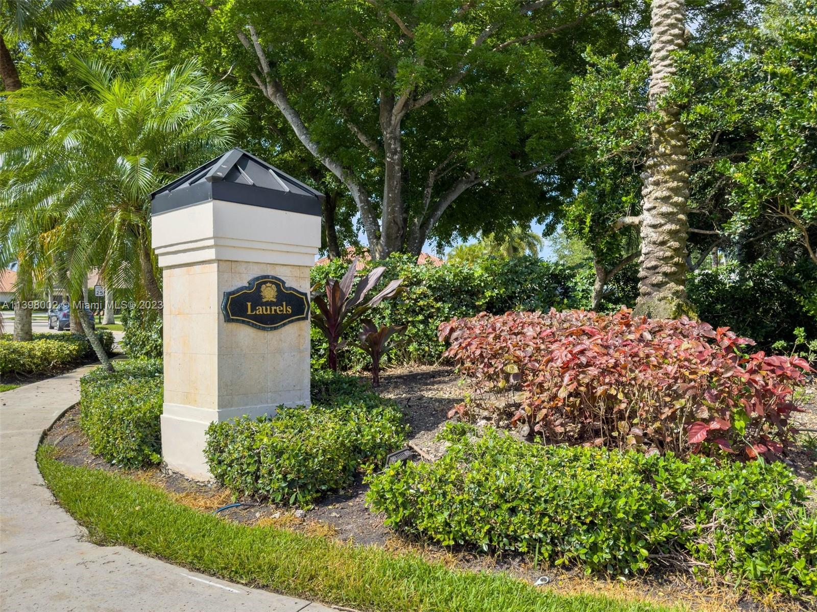 3155 Inverness Weston, FL 33332 - Photo 58 of 58 a front view of a house with garden
