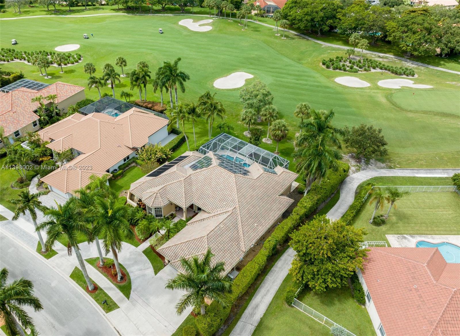 3155 Inverness Weston, FL 33332 - Photo 6 of 58 an aerial view of a house