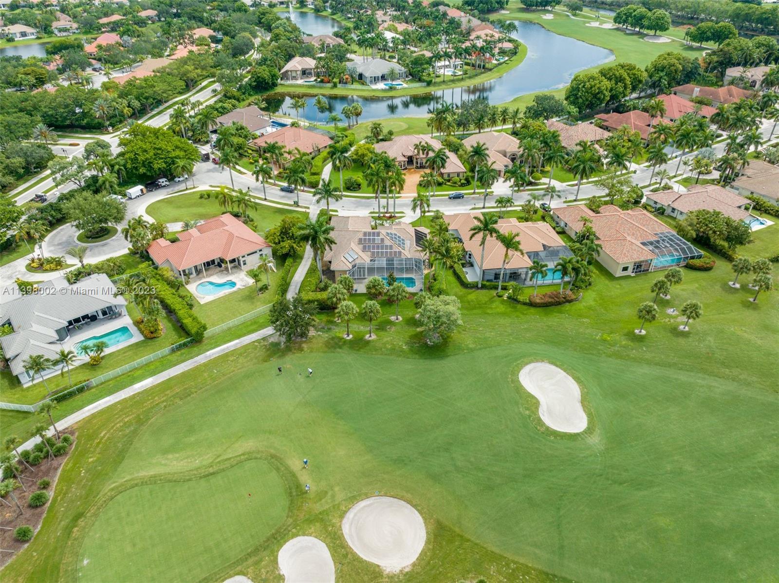 3155 Inverness Weston, FL 33332 - Photo 8 of 58 a view of a swimming pool with a yard