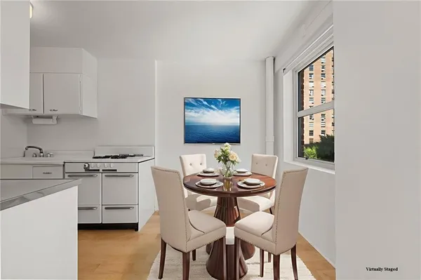 wooden floor and ceiling fan in a room