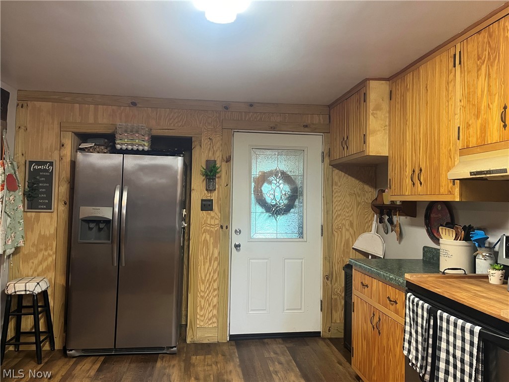 1935 Flint Ridge Road Hopewell, OH 43746 - Photo 20 of 33 Kitchen featuring dark hardwood / wood-style floors and stainless steel fridge