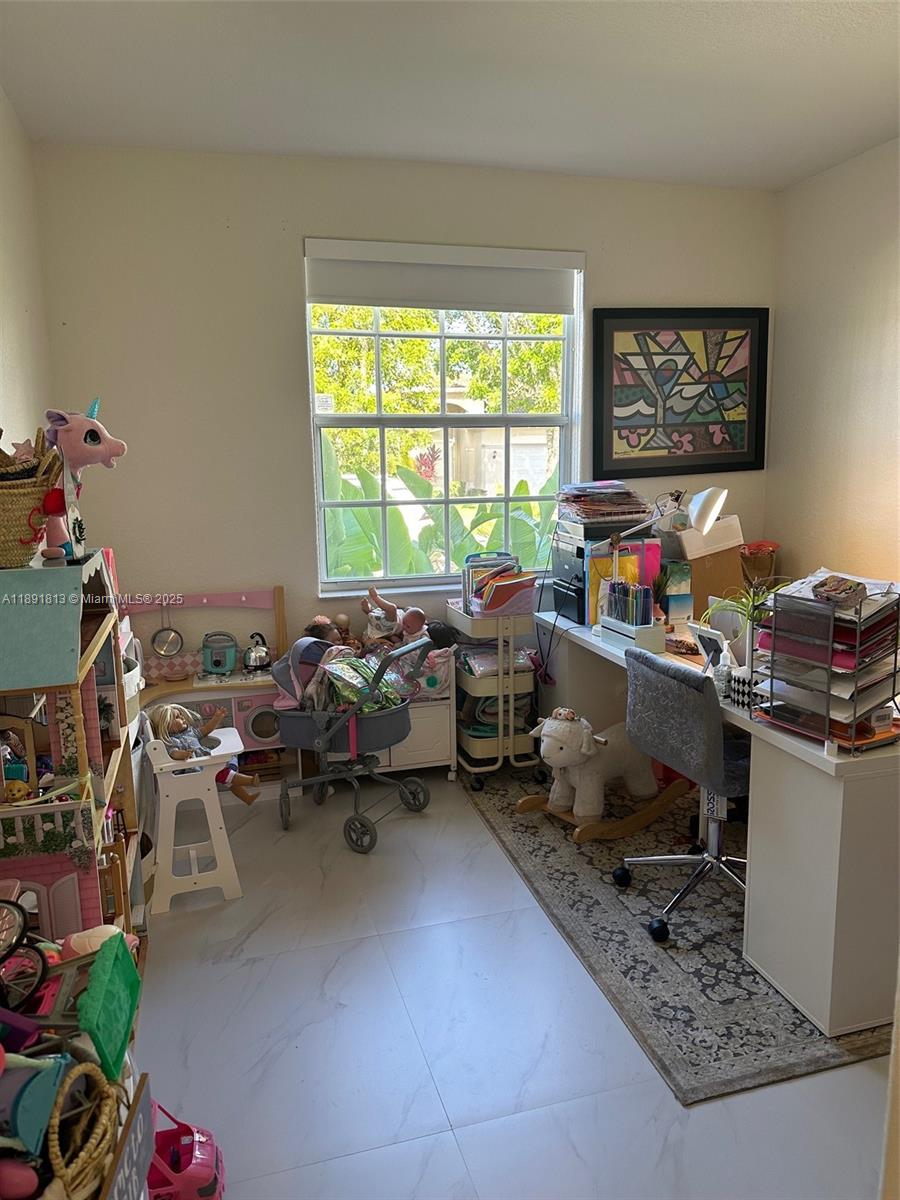 3744 Southwest 156th Court Miami, FL 33185 - Photo 10 of 10 a room with furniture and a window
