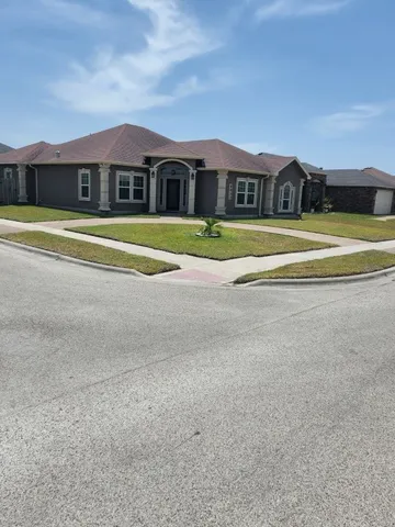 a view of houses with a swimming pool