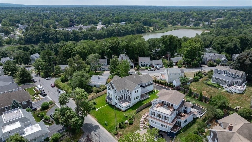 34 Otis Hill Road Hingham, MA 02043 - Photo 2 of 42 an aerial view of a house with pool outdoor seating and yard