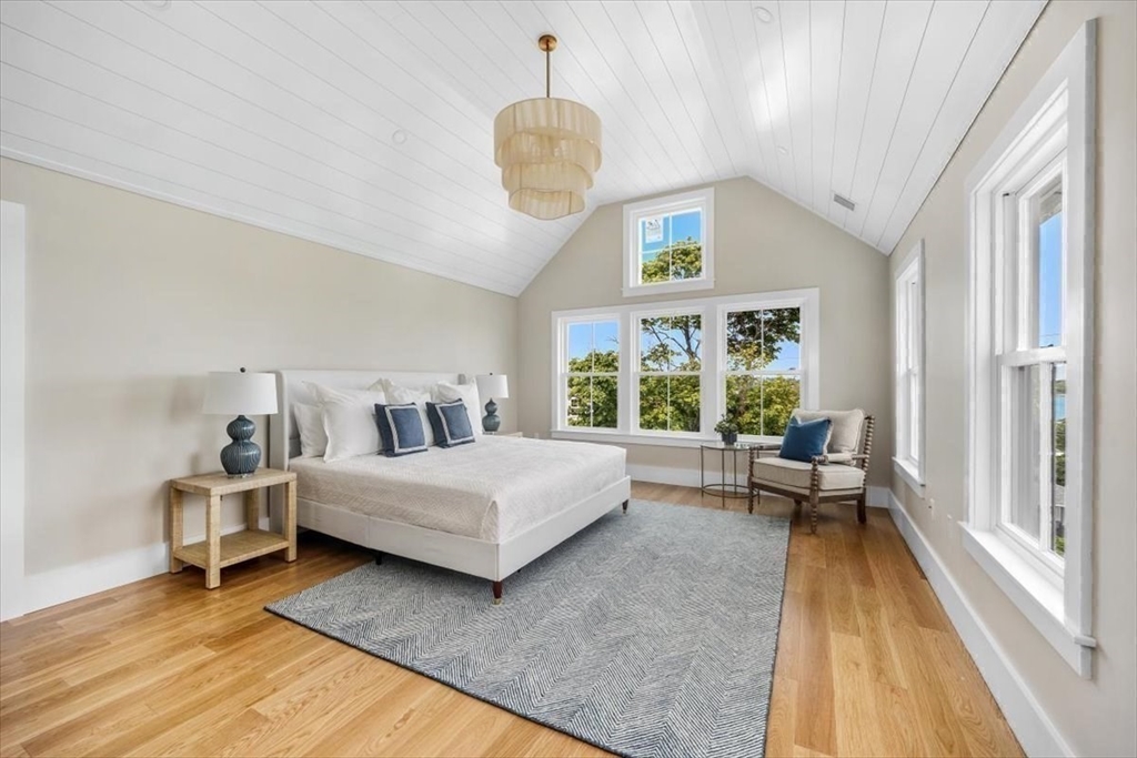 34 Otis Hill Road Hingham, MA 02043 - Photo 21 of 42 a living room with furniture and a large window